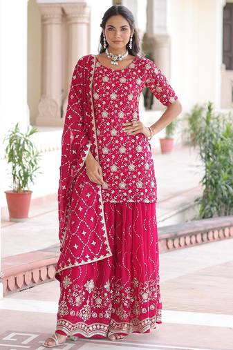 Pink faux georgette rich sequins embroidered kurta with sharara and heavy dupatta