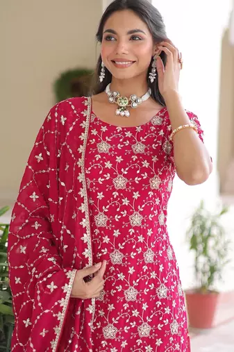 Pink faux georgette rich sequins embroidered kurta with sharara and heavy dupatta