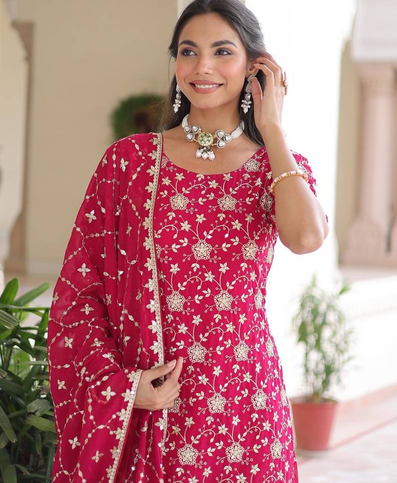 Pink faux georgette rich sequins embroidered kurta with sharara and heavy dupatta
