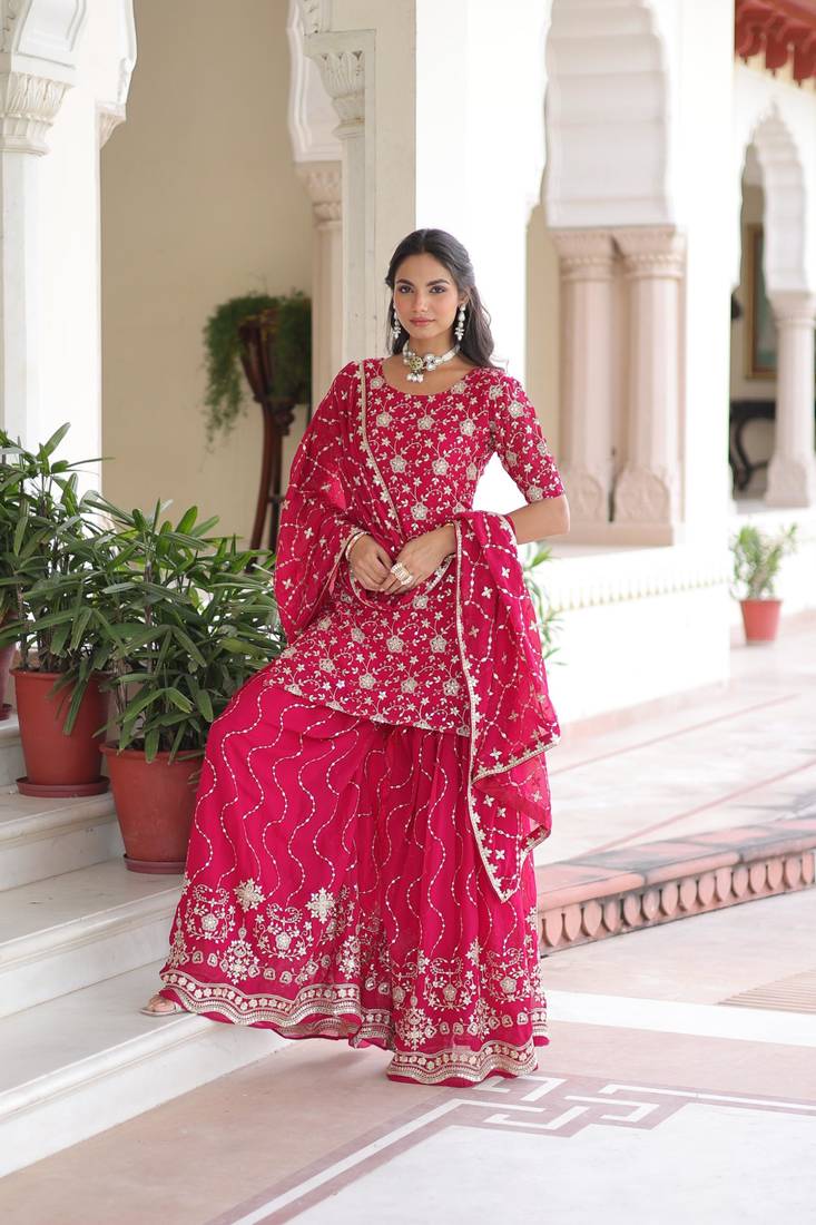 Pink faux georgette rich sequins embroidered kurta with sharara and heavy dupatta