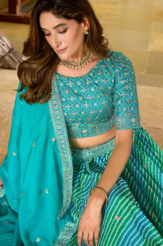 Turquoise Leheriya Print With Embroidered Faux Georgette Lehenga Choli