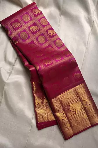 magenta banarasi art silk woven saree with blouse