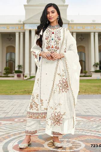 White heavy cotton embroidered semi stitched suits