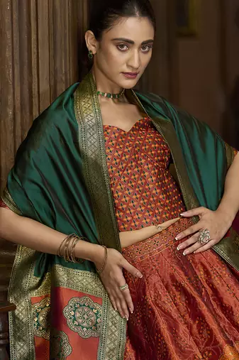 Rust Color Kanjiwaram silk blend Jacquard Lehenga Choli