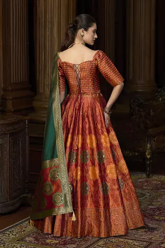 Rust Color Kanjiwaram silk blend Jacquard Lehenga Choli