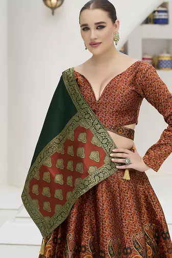 Rust Kanijwaram Jacquard Designer Lehenga Choli For Ceremonial