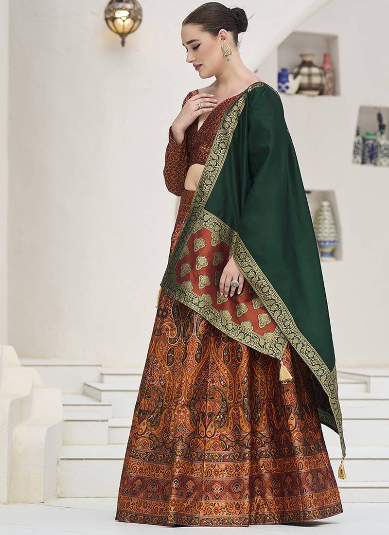 Rust Kanijwaram Jacquard Designer Lehenga Choli For Ceremonial