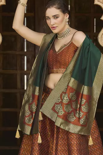 Rust Kanjiwaram silk blend Jacquard Woven Lehenga Choli