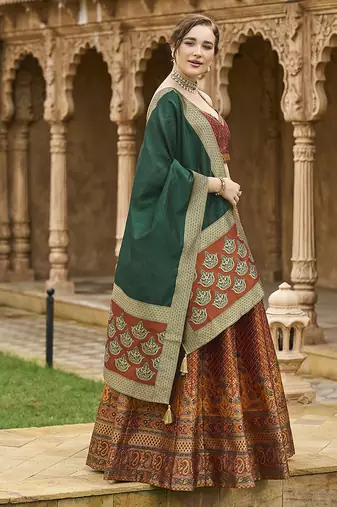 Rust Kanjiwaram silk blend Jacquard Woven Lehenga Choli