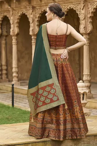 Rust Kanjiwaram silk blend Jacquard Woven Lehenga Choli