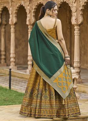 Yellow Kanjiwaram silk blend Jacquard Woven Lehenga Choli 4