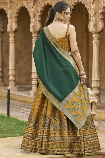 Yellow Kanjiwaram silk blend Jacquard Woven Lehenga Choli