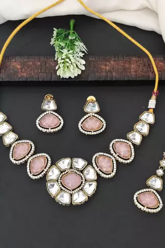 Elegant pink stone kundan necklace set with matching earrings