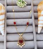 Elegant gold-plated red stone pendant chain with pearl drops