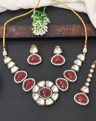 Red stone kundan necklace set with mirror-cut detailing, elegant bridal jewellery with matching earrings 1