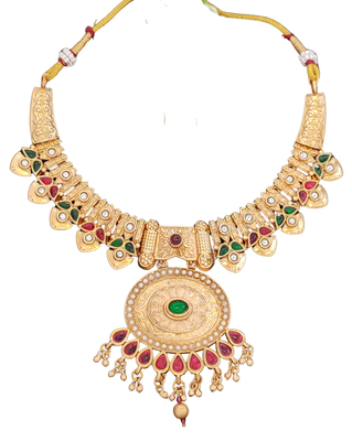 temple necklace set with green and ruby stones, intricate detailing and matching earrings 4