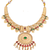 temple necklace set with green and ruby stones, intricate detailing and matching earrings