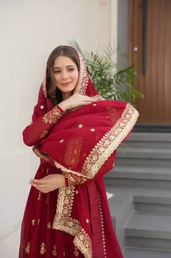 Maroon faux georgette embroidery zari sequins flared gown with heavy dupatta