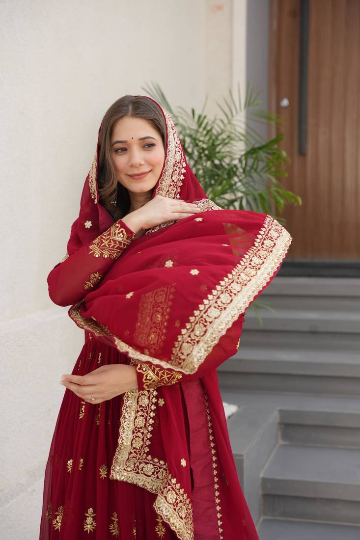 Maroon faux georgette embroidery zari sequins flared gown with heavy dupatta