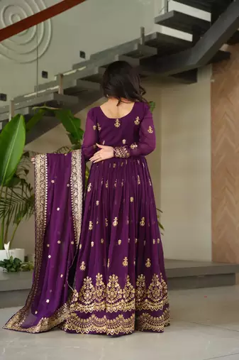 Purple faux georgette embroidery zari sequins flared gown with heavy dupatta