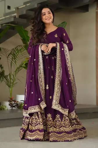 Purple faux georgette embroidery zari sequins flared gown with heavy dupatta