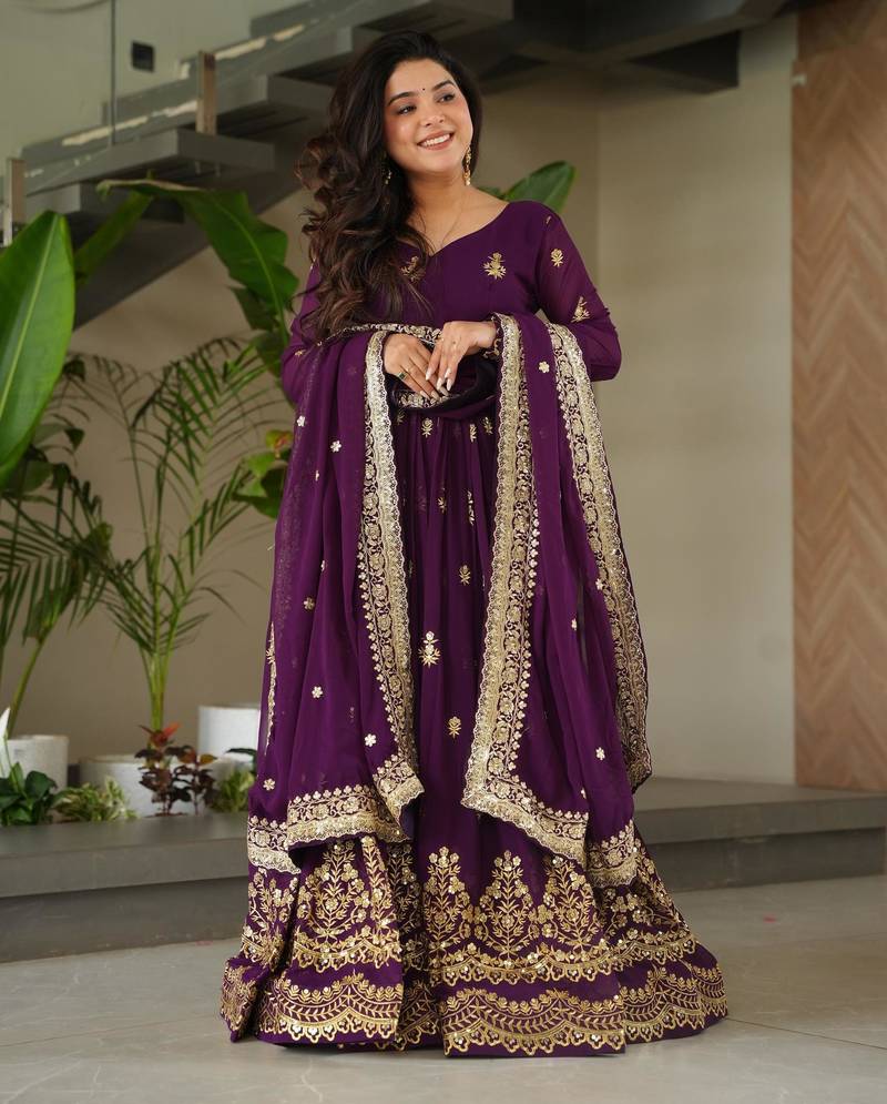 Purple faux georgette embroidery zari sequins flared gown with heavy dupatta