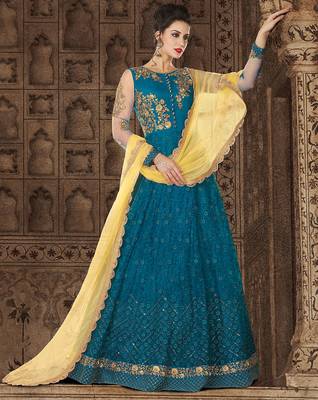Blue Net Heavy Embroidered Designer Semi Stiched Suit 1