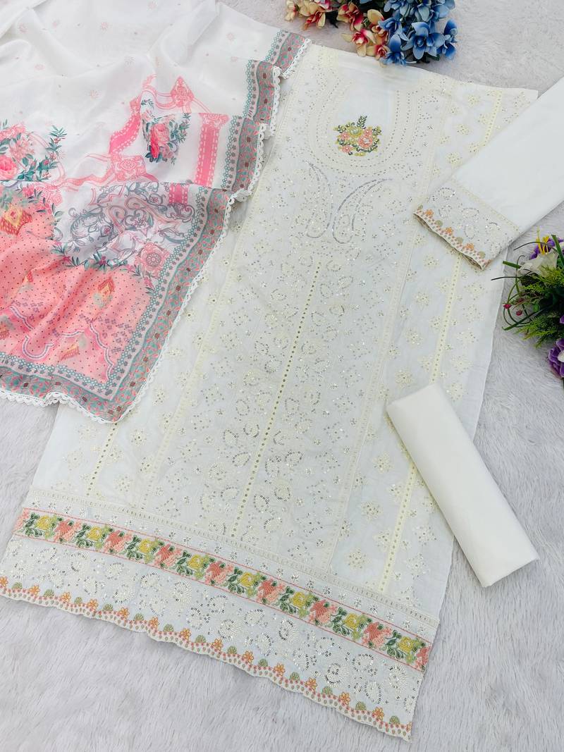 White cambric cotton semi stitched suit with embroidery & sequence work