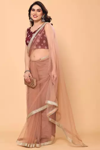 beige net party wear saree with maroon silk blouse