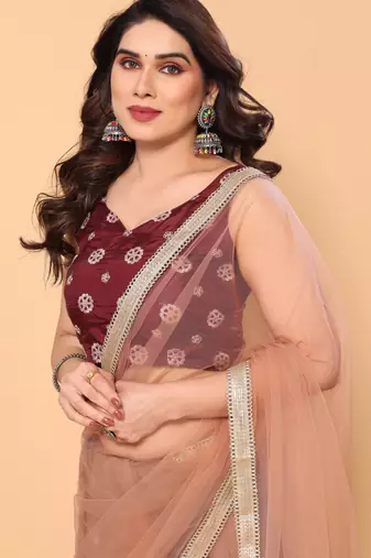 beige net party wear saree with maroon silk blouse