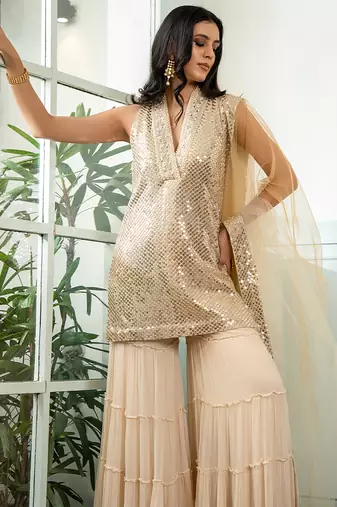 Gold embroidered georgette gharara set