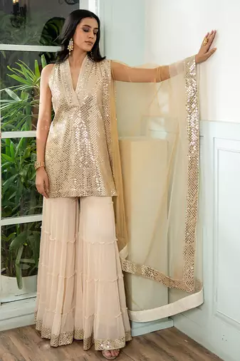 Gold embroidered georgette gharara set