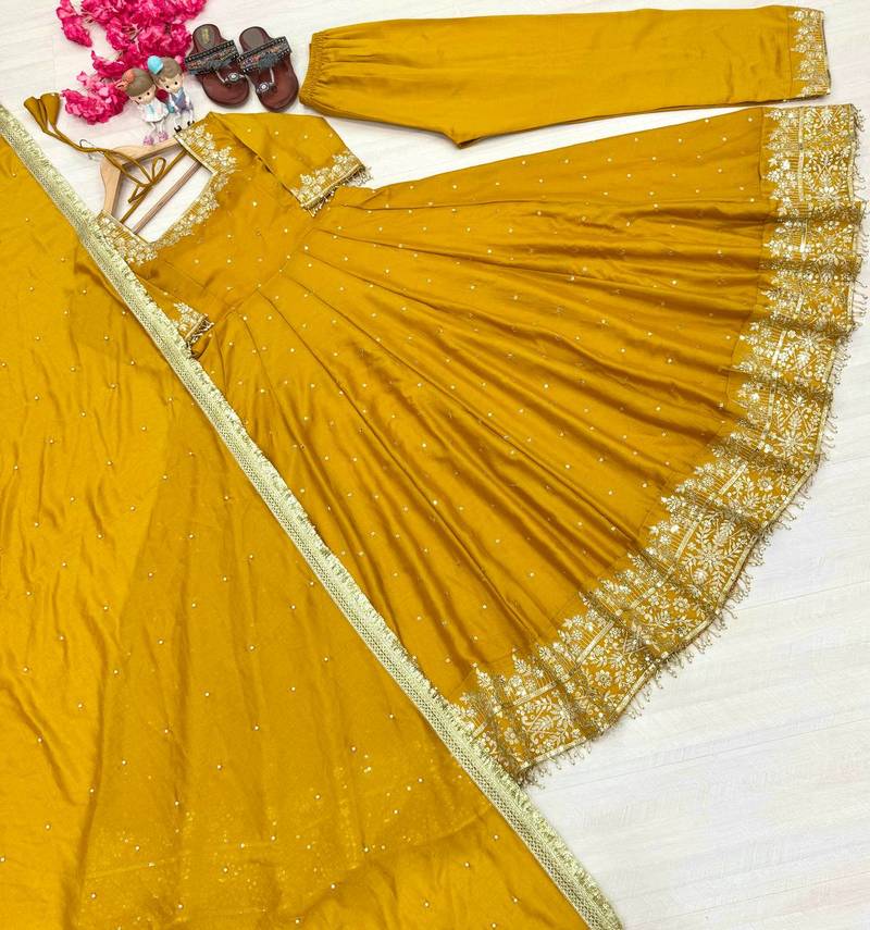 Yellow colour vichitra silk embroidery work fully stitched gown