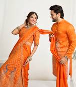Orange embroidered lehenga & matching men's kurta set couple combo