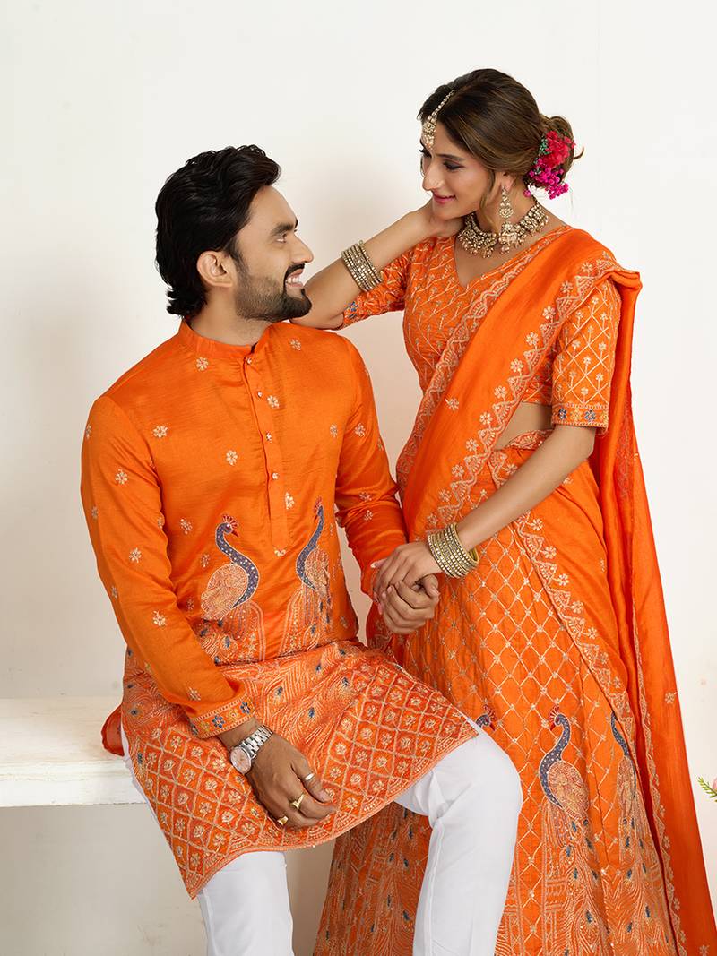 Orange embroidered lehenga & matching men's kurta set couple combo