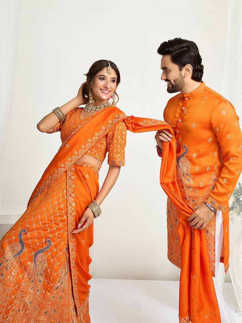 Orange embroidered lehenga & matching men's kurta set couple combo