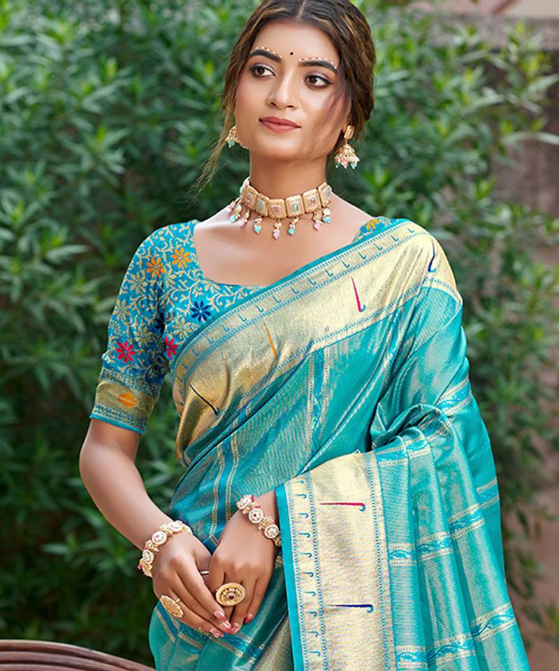 teal green   silk blend woven work traditional saree