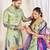 Green silk men's  kurta with payjama and semi stitched lehenga choli couple combo