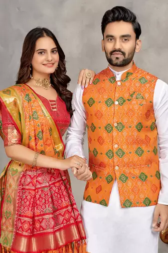 Orange silk men's kurta with payjama and designer saree couple combo