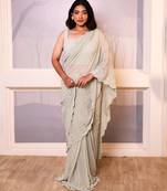 Green embroidered georgette saree