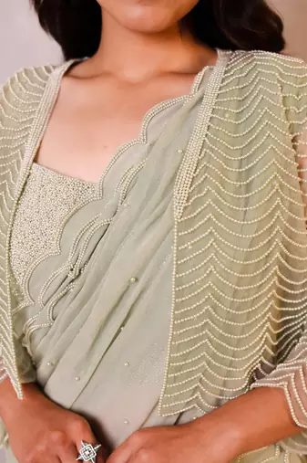 Green embroidered georgette saree