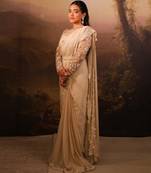 Ivory embroidered net saree