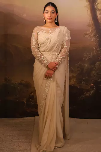 Ivory embroidered net saree