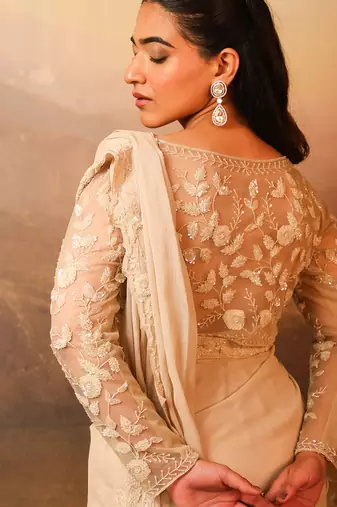 Ivory embroidered net saree