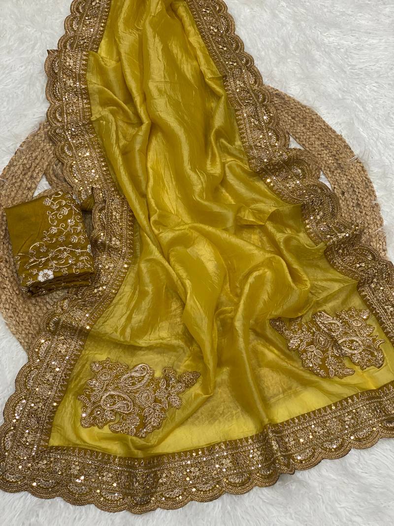 golden color embroidered glass tissue fabric saree