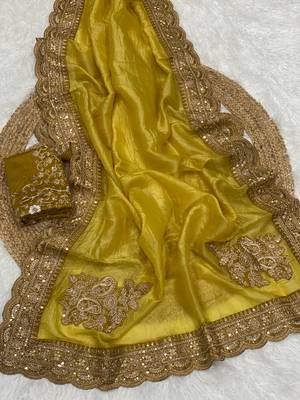 golden color embroidered glass tissue fabric saree 1
