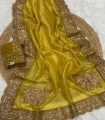 golden color embroidered glass tissue fabric saree