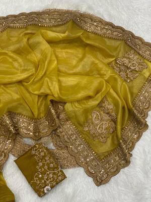 golden color embroidered glass tissue fabric saree 2