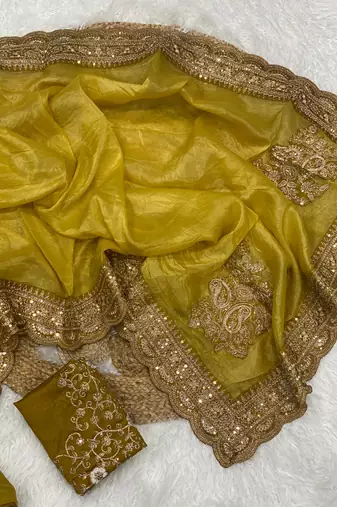 golden color embroidered glass tissue fabric saree