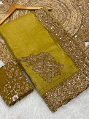 golden color embroidered glass tissue fabric saree 3